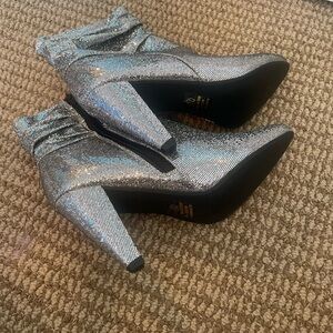 Sparkly silver boots with kitten heel.Condition new worn once.Great 4 going out!
